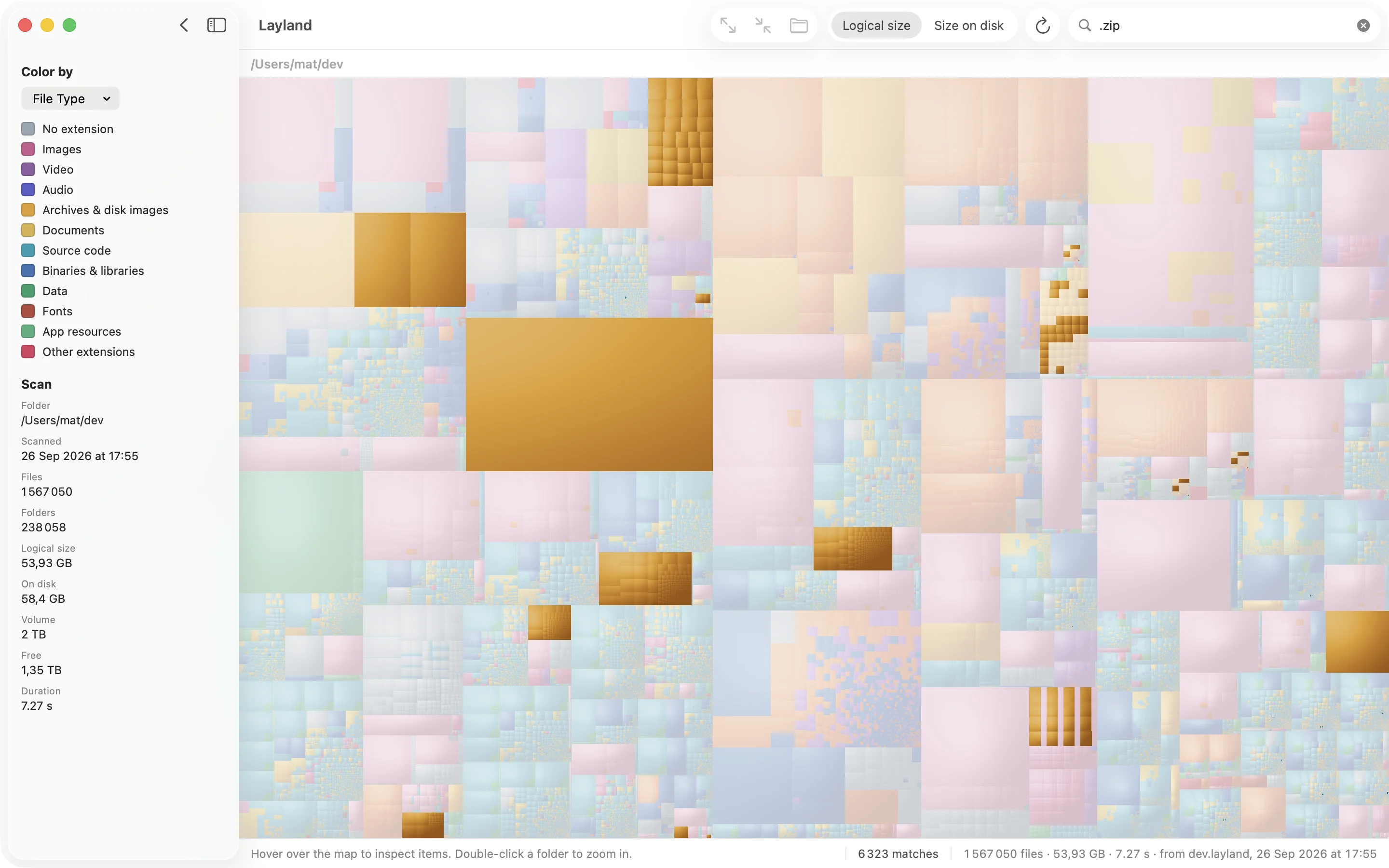 A search for .zip: every zip archive lit in its own color, everything else dimmed, 6,323 matches in the status bar